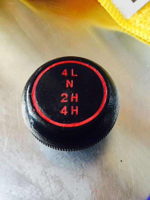 1978 Ford Bronco - Transfer case shift knob shows 4-wheel drive and 2-wheel drive options.