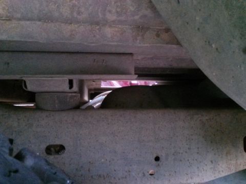 1996 Ford Bronco - Close-up view of the undercarriage, showing structural components and suspension elements.