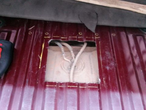 1996 Ford Bronco - Access panel removed to reach the fuel tank and lines.