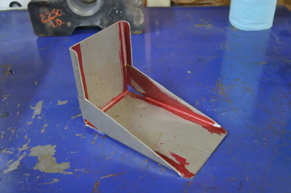 Onboard air compressor bracket.