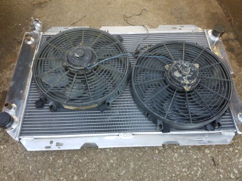 1988 Ford Bronco - Radiator assembly with dual electric cooling fans.