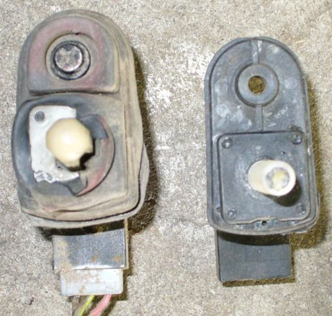 1992 Ford Bronco - Driver's door plungers, stock style on left, slightly different F-series one on right.