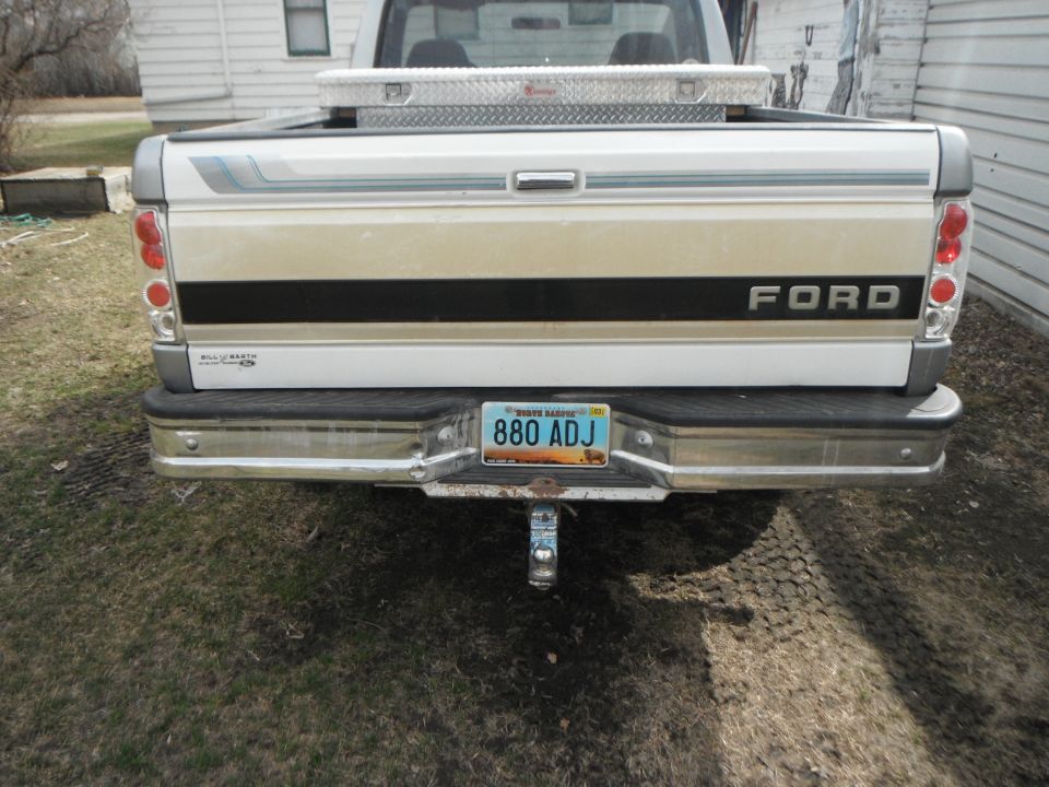 Rear of a 1995 Ford F-150 with a toolbox in the bed