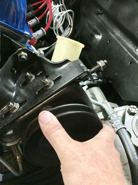 1978 Ford Bronco - Close-up of an engine part, possibly from a 1978 Ford Bronco.