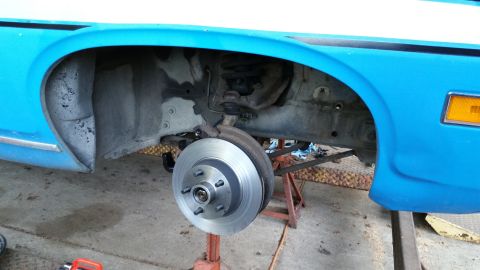 1971 Ford Ranchero - Front wheel brake assembly of a 1971 Ford Ranchero, showing a newly installed rotor.