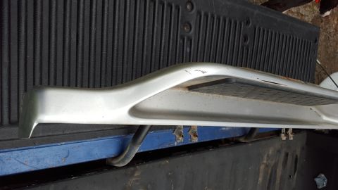 1994 Ford Bronco - A single running board is shown, detached from a vehicle, with visible wear and tear.