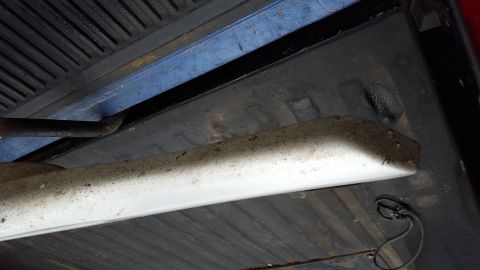 1994 Ford Bronco - A running board is visible in the bed of a vehicle.