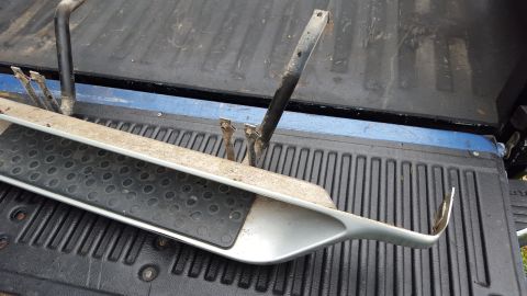 1994 Ford Bronco - A single running board is shown in a truck bed, with visible mounting brackets.