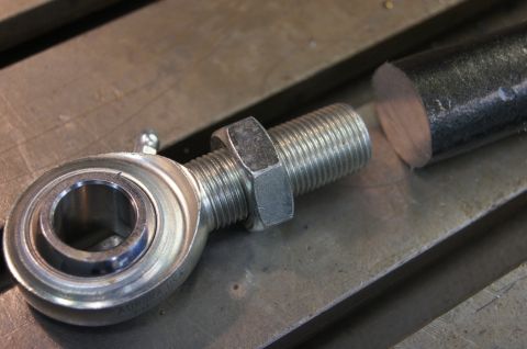 1979 Ford Bronco - Close-up of a rod end bearing assembly, likely a vehicle suspension or steering component.