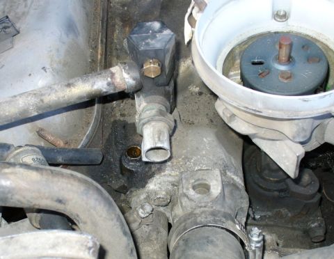 1992 Ford Bronco - Not sure what to do about removing water neck stuff (EEC coolant temp sensor connector) to release the lower manifold... There's the 4th co…