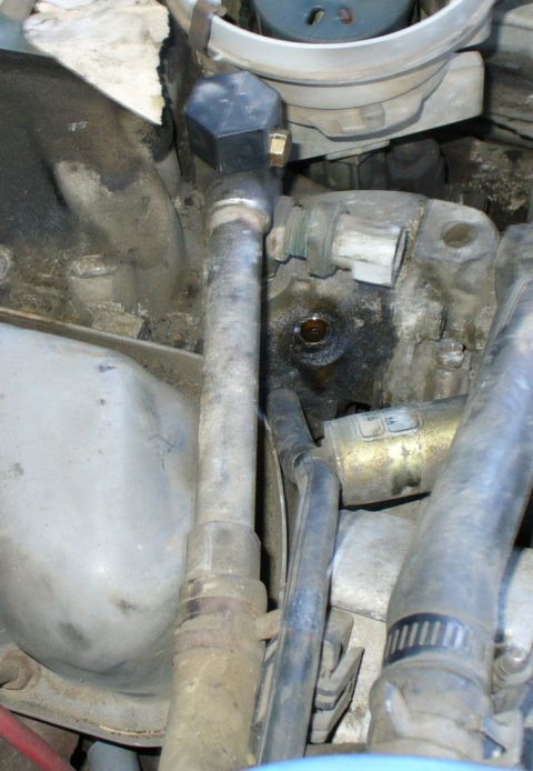 1992 Ford Bronco - Side view of the sensor connector and where I assume it has to be disconnected at the end of the heater hot water tube on the passenger sid…