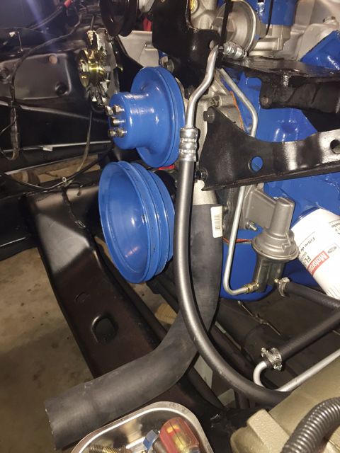 1978 Ford Bronco - Engine pulleys and fuel pump assembly are visible in this close-up shot.