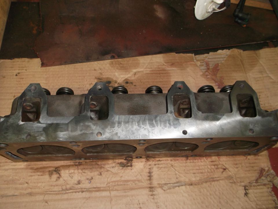 Engine cylinder head with visible valve springs