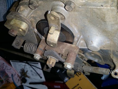 2007 Subaru Impreza - Close-up view of carburetor linkage components, including springs and fasteners.