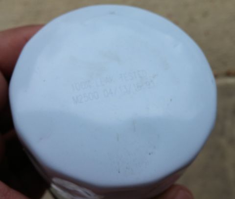 2000 Ford Crown Victoria - Oil filter marked '100% LEAK TESTED M2500 04/13/16 01'.