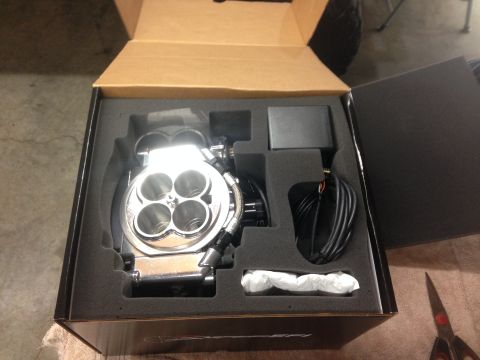 1979 Ford Bronco - A new Holley Sniper throttle body kit is shown packed in its original box, ready for installation.
