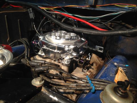 1979 Ford Bronco - Close-up of an engine bay a Holley Sniper EFI installation with visible wiring and components.