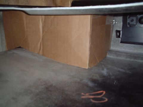 2000 Ford Excursion - Here is how I "boxed in" the rear door's latch and handle with cardboard prior to covering it in fiberglass to make the rear door airtight.