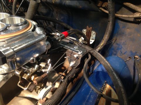 1979 Ford Bronco - Engine bay detail showing a carburetor and various hoses and wiring.
