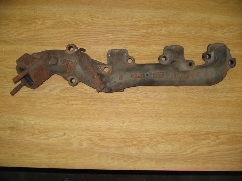 1968 Mercury Cougar - Exhaust manifold with visible casting numbers, likely a replacement part.