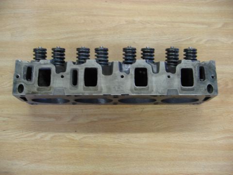 1968 Mercury Cougar - A close-up view of an engine cylinder head, showing its internal structure and valve springs.