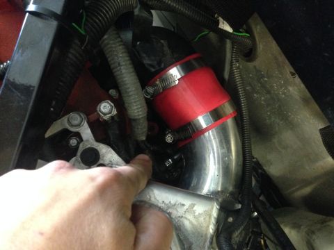 2015 Subaru Impreza - Engine bay intake pipe with a red silicone coupler and metal clamps.