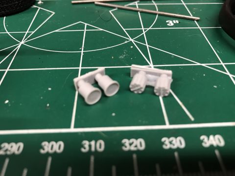 1989 Ford Bronco - Model exhaust pipes are shown on a cutting mat with ruler markings, suggesting they are part of a scale model build.