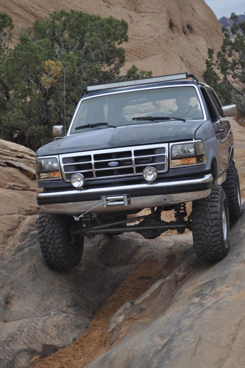 1991 Ford Bronco - This modified Ford Bronco navigates a rocky trail, its off-road capabilities.
