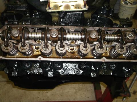 1964 Ford Galaxie - Engine valve train components, including rocker arms and springs, are visible in this close-up shot.