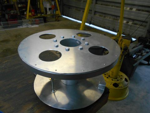 1992 Ford Bronco - This metal spool appears to be a custom fabrication or repurposed industrial part.