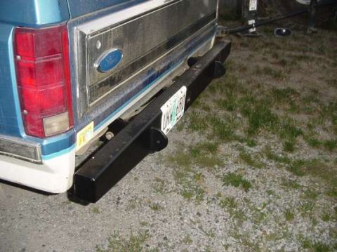 1996 Ford Bronco - Rear view of a blue Ford Bronco showing its taillight and bumper.