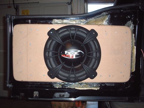 2000 Ford Excursion - Here is a pic with the Rockford HX2 12" installed, with the Kicker VR12 grill. If you look closely you can see the fiberglass strips that h…