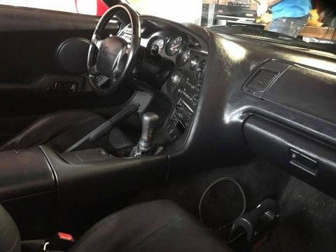 1994 Toyota Supra - Interior view of a car, showing the dashboard, steering wheel, and center console.