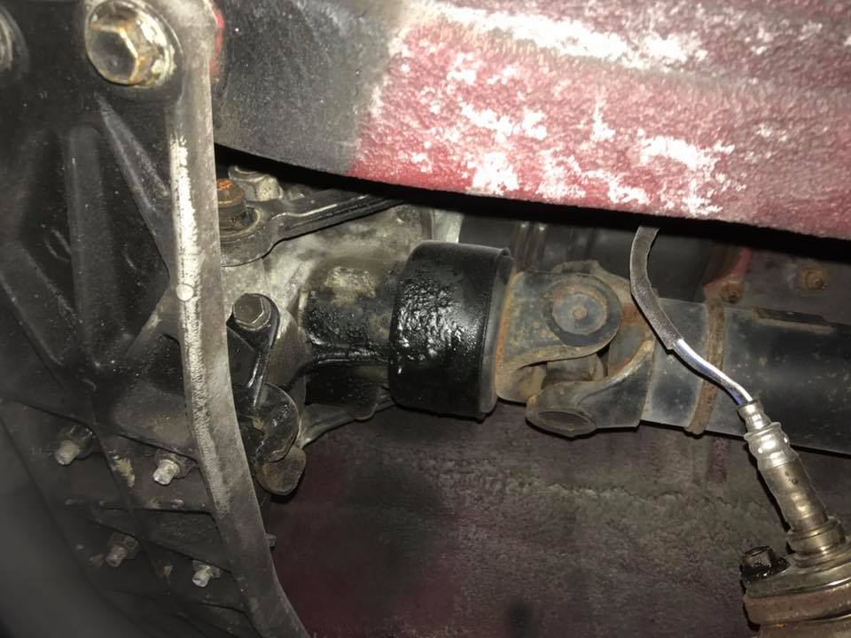 underneath car driveshaft and U-joint
