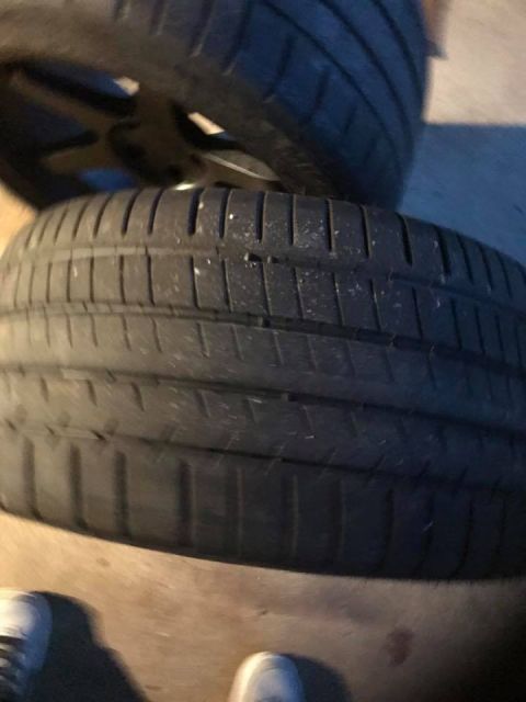 1994 Toyota Supra - Two tires are visible in this close-up shot, with one tire in sharp focus.