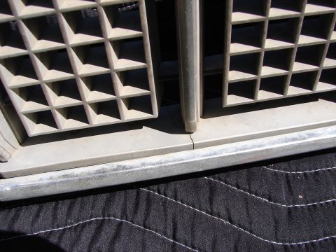 1973 Ford Ranchero - Detail of a vehicle's interior ventilation grille and surrounding trim.