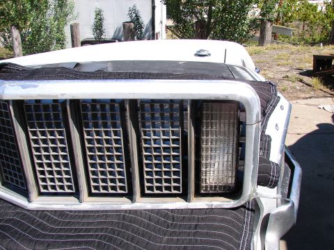 1973 Ford Ranchero - Close-up of the front grille and headlight assembly of a 1973 Ford Ranchero.