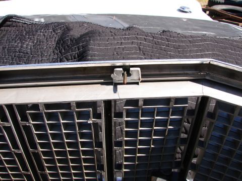 1973 Ford Ranchero - Close-up of the grille and hood latch mechanism on a 1973 Ford Ranchero.