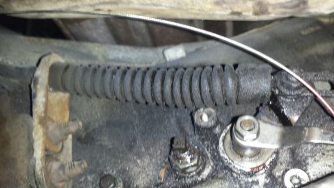 1976 Ford Ranchero - The parking brake cable assembly shows wear and grease buildup.