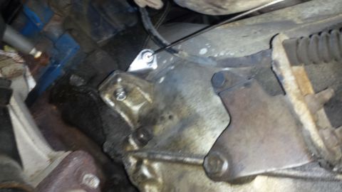 1976 Ford Ranchero - Close-up view of greasy engine and transmission components, with a visible watermark.