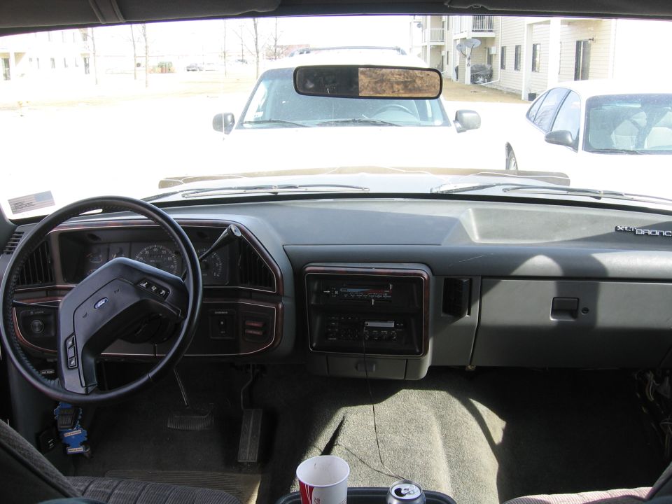 Interior dashboard and steering wheel of Ford Bronco truck