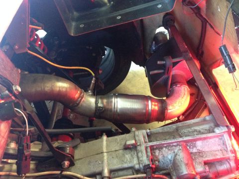 2015 Subaru Impreza - Close-up view of a vehicle's exhaust system and transmission components.