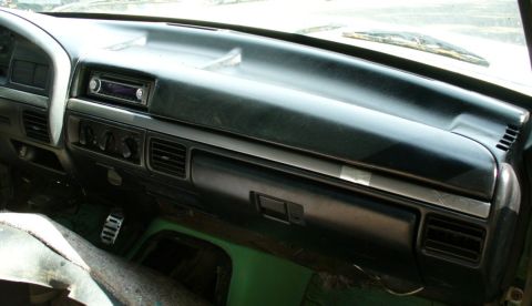 1992 Ford Bronco - Dash dyed a uniform black, along with a much improved dash pad and used stereo.
