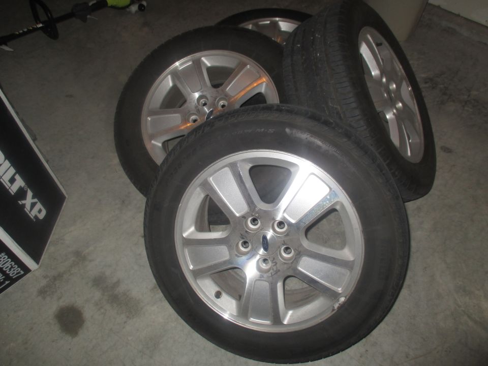 2 235/55/17 Pirelli tires, that will need replacing
