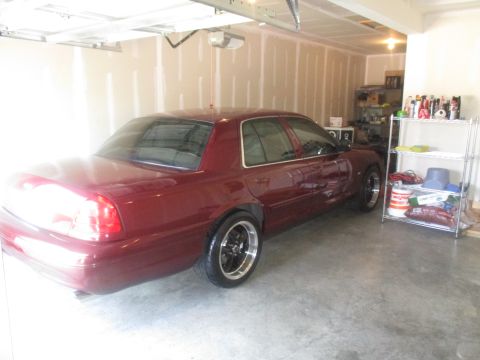 2004 Ford Crown Victoria - American Racing wheels back on.