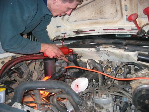 1989 Ford Bronco - When your toolbox does not include a funnel, and you are sick of going out and buying tools you dont have, you improvise. Here, cut off one…