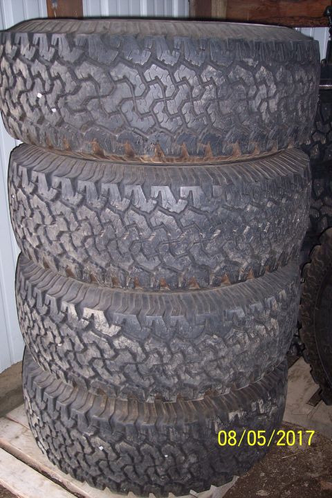 1989 Ford Bronco - A stack of four off-road tires with aggressive tread patterns are shown. A date stamp of "08/05/2017" is visible in the lower right corner.