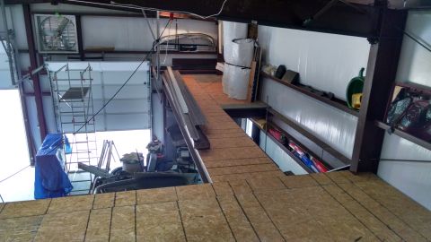 2004 Land Rover Land Rover - I had to negotiate with Lowe's for a while to get them to send a delivery driver who'd drive the forklift inside & set the stack of subfloo…