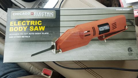 1988 Ford Bronco - The image shows the box for a Chicago Electric Power Tools Electric Body Saw. The box is orange and grey and displays the product name and…
