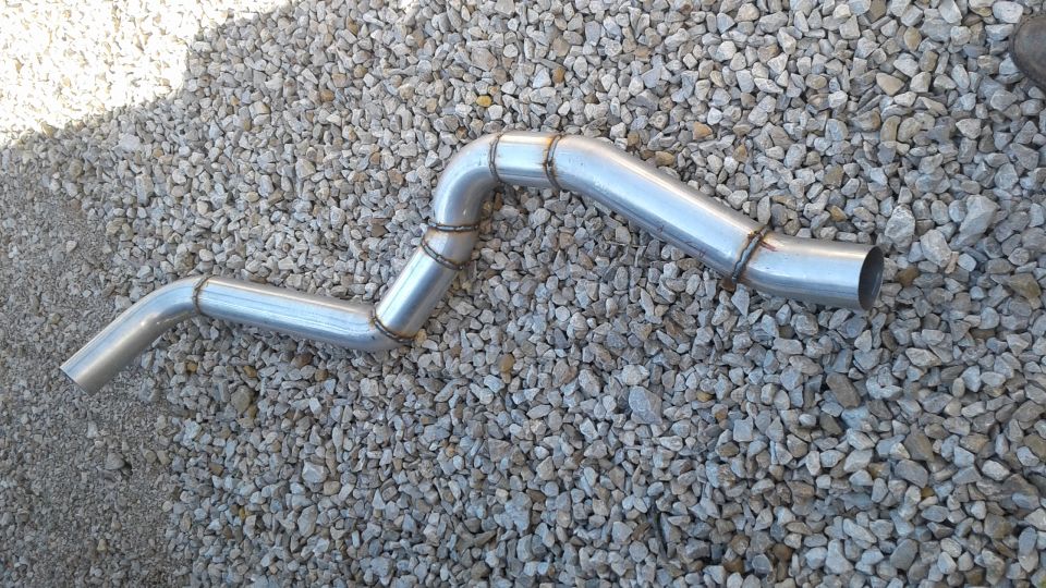 Custom bent stainless steel exhaust pipe with multiple welds